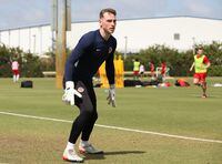 Tom McGill left Canada for England as a boy but kept coming back to see his father and family. Now the 22-year-old, who is the third-string goalkeeper at English Premier League side Brighton, is proud and happy to be in camp with Canada ahead of CONCACAF Nations League games against Curacao and Honduras. McGill is shown at the Men's National Team Training Session in Fort Lauderdale, FL., March 22, 2023. THE CANADIAN PRESS/HO-Canada Soccer **MANDATORY CREDIT** 