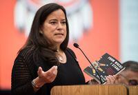 Independent candidate for Vancouver-Granville, Jody Wilson-Raybould holds a copy of her book "From Where I Stand" while addressing delegates during the B.C. Assembly of First Nations annual general meeting at the Musqueam First Nation, in Vancouver on Thursday, Sept. 19, 2019. THE CANADIAN PRESS/Darryl Dyck