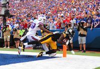 Diontae Johnson #18 of the Pittsburgh Steelers catches a pass for a touchdown against Levi Wallace #39 of the Buffalo Bills during the fourth quarter at Highmark Stadium on September 12, 2021 in Orchard Park, New York.