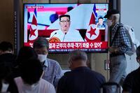 People watch a TV showing an image of North Korea leader Kim Jong Un, during a news program at the Seoul Railway Station in Seoul, South Korea, Thursday, July 28, 2022. Kim warned he's ready to use his nuclear weapons in potential military conflicts with the United States and South Korea, state media said, as he unleashed fiery rhetoric against rivals he says are pushing the Korean Peninsula to the brink of war. (AP Photo/Ahn Young-joon)