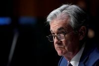 Chairman of the Federal Reserve Jerome Powell listens during a Senate Banking Committee hearing on "The Quarterly CARES Act Report to Congress" on Capitol Hill in Washington, U.S., December 1, 2020. Susan Walsh/Pool via REUTERS