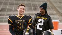 This photo provided by Skechers shows Tony Romo and Snoop Dogg  from a scene from Skechers 2023 Super Bowl NFL football spot. ( Skechers via AP)