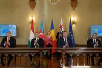 From left, Hungarian Prime Minister Viktor Orban, Azerbaijani President Ilham Aliyev, European Commission President Ursula von der Leyen, Romanian President Klaus Iohannis, Romanian Premier Nicolae Ciuca and Georgian Prime Minister Irakli Garibashvili applaud after a signing ceremony at the Cotroceni presidential palace in Bucharest, Romania, Saturday, Dec. 17, 2022. The leaders of Hungary, Romania, Georgia and Azerbaijan met in Romania's capital to sign an agreement on an undersea electricity connector that could become a new power source for the European Union amid a crunch on energy supplies caused by the war in Ukraine. (AP Photo/Vadim Ghirda)