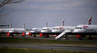 FILE PHOTO: British Airways planes are seen parked at Bournemouth Airport, as the spread of the coronavirus disease (COVID-19) continues, Bournemouth, Britain, April 1, 2020. REUTERS/Paul Childs/File Photo