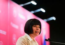 Official Languages Minister Ginette Petitpas Taylor addresses the Montreal Chamber of Commerce, in Montreal, Monday, May 8, 2023. The House of Commons has passed third reading of a bill that aims to enshrine a francophone immigration program into law. THE CANADIAN PRESS/Christinne Muschi