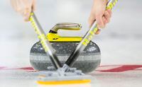 Members of team P.E.I. sweep their rock during the 9th draw against team Quebec at the Brier in Brandon, Man. Tuesday, March 5, 2019. Kelowna, B.C., is set to host the Canadian men's curling championship for the first time since 1968. Curling Canada announced Kelowna will host the 2021 Tim Hortons Brier on Thursday. THE CANADIAN PRESS/Jonathan Hayward