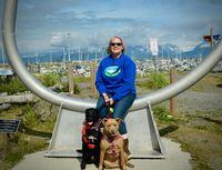 Mary Anne Robbins and her dogs Keira, left, and Aylish, pictured during a trip through Alaska for Tales from the Golden Age. Handout