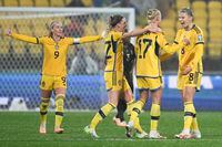 Sweden celebrate after defeating South Africa in their Women's World Cup Group G soccer match in Wellington, New Zealand, Sunday, July 23, 2023. (AP Photo/Andrew Cornaga)
