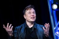 (FILES) In this file photo taken on April 11, 2022, Elon Musk, founder of SpaceX, speaks during the Satellite 2020 at the Washington Convention Center in Washington, DC. - Elon Musk said on May 13, 2022  he was putting a temporary halt on his much-anticipated deal to buy Twitter, sending shares in the social media giant plunging. (Photo by Brendan Smialowski / AFP) (Photo by BRENDAN SMIALOWSKI/AFP via Getty Images)