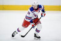 New York Rangers left wing Artemi Panarin (10) warms up before an NHL hockey game against the Washington Capitals in Washington, Saturday, Feb. 20, 2021. New York Rangers star Artemi Panarin is taking a leave of absence after a Russian tabloid printed allegations from a former coach that he attacked an 18-year-old woman in Latvia in 2011. Ex-NHL enforcer Andrei Nazarov is the source for the report after coaching Panarin in the Kontinental Hockey League. Nazarov says he was motivated to speak about it because he disagreed with Panarins repeated criticism of the Russian government. Panarin denied the allegations in a statement released by the Rangers. (AP Photo/Nick Wass, File)