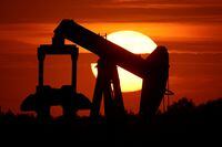 An oil pump of IPC Petroleum France is seen at sunset outside Soudron, near Reims, France, August 24, 2022.