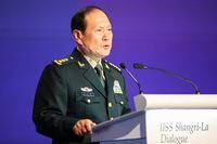 China's Defense Minister General Wei Fenghe speaks at a plenary session during the 19th International Institute for Strategic Studies (IISS) Shangri-la Dialogue, Asia's annual defense and security forum, in Singapore, Sunday, June 12, 2022. (AP Photo/Danial Hakim)
