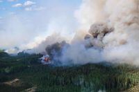 Smoke rises above the southeast perimeter of the Paskwa fire (HWF030) as it burns near Fox Lake, Alberta, Canada May 16, 2023. Alberta Wildfire/Handout via REUTERS   THIS IMAGE HAS BEEN SUPPLIED BY A THIRD PARTY.