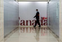 A security guard walks at the Canada's Consulate General, in Shanghai, China, May 10, 2023. REUTERS/Aly Song