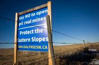 A sign against the Alberta government's new coal mining policy.