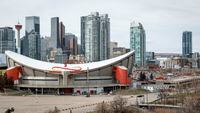 The Scotiabank Saddledome is shown with Calgary's downtown area in the background on Tuesday, April 25, 2023. THE CANADIAN PRESS/Jeff McIntosh