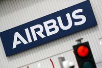 FILE PHOTO: The logo of Airbus is pictured at the entrance of the Airbus facility in Bouguenais, near Nantes, France, July 2, 2020. REUTERS/Stephane Mahe