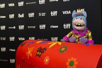 CBC's Gary the Unicorn is photographed with the "Tickle Trunk" on the red carpet for the feature documentary film "Mr: Dressup: The Magic of Make-Believe" during the Toronto International Film Festival, Saturday, September 9, 2023. THE CANADIAN PRESS/Christopher Katsarov