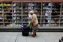 FILE PHOTO-A customer shops in a supermarket in Nice, France, August 18, 2022. REUTERS/Eric Gaillard