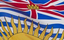 British Columbia's provincial flag flies in Ottawa, Friday July 3, 2020. Electricity has been restored to nearly 4,000 homes and businesses in Kamloops, B.C., after a rapidly spreading grass fire swept through an area not far from the city centre. THE CANADIAN PRESS/Adrian Wyld