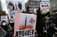 SEOUL, SOUTH KOREA - MARCH 26: Protesters participate in a rally against the North Korea's intercontinental ballistic missile (ICBM) launch on March 26, 2022 in Seoul, South Korea. North Korea fired an ICBM toward the East Sea last Thursday, South Korea's military said, a move sharply escalating tensions in the region. (Photo by Chung Sung-Jun/Getty Images)