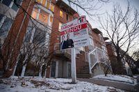 A sign advertising a condo for sale on Poudriere street in the neighbourhood of Verdun in Montreal on Monday, December 10, 2018. Ottawa and Montreal are two cities bucking a nationwide downward trend in the real estate market; sales in most of the rest of Canada are languishing.