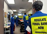 Climate protesters with Greenpeace occupy the office of Canada's Deputy Prime Minister and Minister of Finance Chrystia Freeland in Toronto, Ontario, Canada, February 15, 2024. REUTERS/Kyaw Soe Oo
