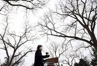 The canopy of tree branches in the Dominion Arboretum is seen above Prime Minister Justin Trudeau as he speaks about the government's updated climate change plan in Ottawa, on Friday, Dec. 11, 2020. THE CANADIAN PRESS/Justin Tang