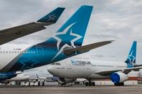 The Air Transat planes are photographed at Pearson airport in Toronto, on Thursday, Sept., 10, 2020. (Christopher Katsarov/The Globe and Mail)