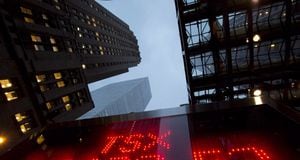 A TSX tote board is pictured in Toronto, on Dec. 31, 2012. THE CANADIAN PRESS/Frank Gunn