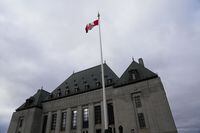 The flag of the Supreme Court of Canada flies on the east flag pole in Ottawa, on Monday, Nov. 28, 2022. THE CANADIAN PRESS/Sean Kilpatrick