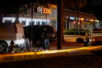Police respond to the scene of a shooting that injured multiple people near a restaurant where a witness said the rapper French Montana had been preparing to film a music video, in Miami Gardens, Fla. on Thursday, Jan. 5, 2023. (Eva Marie Uzcategui/The New York Times)