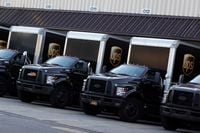 United Parcel Service (UPS) vehicles are seen at a facility in Brooklyn on May 9.