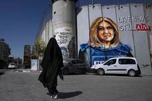 FILE - A mural depicting slain Palestinian-American journalist Shireen Abu Akleh is drawn on part of Israel's controversial separation barrier, in the West Bank city of Bethlehem, Wednesday, July 6, 2022. The mural by Palestinian artist Taqi Spateen appeared early Wednesday, days ahead of a visit by U.S. President Joe Biden. According to a report released by The Committee to Protect Journalists on Tuesday, May 9, 2023, the Israeli military has systematically evaded accountability in the deaths of 20 journalists over the past two decades, launching slow and opaque investigations that have never resulted in prosecution or punishment. (AP Photo/Mahmoud Illean, File)