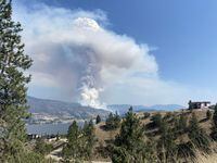 The Thomas Creek Fire, 1.5 km east of Skaha Lake, is shown near Okanagan Falls, B.C. in this recent photo. A new wildfire in British Columbia has forced the evacuation of nearly 80 properties, while residents of hundreds more homes around the south Okanagan lakeside community of Okanagan Falls have been ordered to be ready to go on short notice. THE CANADIAN PRESS/Penticton Herald-Mark Brett