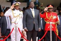 Kenya's President William Ruto stands as the Kenyan national anthem is played during his swearing-in ceremony at Moi International Stadium in Nairobi, Kenya September 13, 2022. REUTERS/Baz Ratner