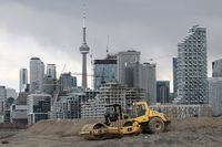 Construction equipment is parked on an Eastern Waterfront work site after Alphabet's Sidewalk Labs announced it pulled out of the neighbouring "smart city" project due to economic uncertainty in Toronto, Ontario, Canada May 7, 2020.  REUTERS/Chris Helgren