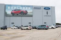 A parking lot with employees vehicles at the Ford assembly plant in Oakville, Ont., on Thursday, March 19, 2020. THE CANADIAN PRESS/Nathan Denette