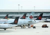 Air Canada planes sit on the tarmac at Pearson International airport during the COVID-19 pandemic in Toronto on Wednesday, Oct. 14, 2020. THE CANADIAN PRESS/Nathan Denette                                                                             