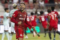 Toronto FC midfielder Alejandro Pozuelo celebrates after teammate Ralph Priso, not shown, scores his team's game winning goal against Atlanta United during second half MLS action in Toronto on Saturday June 25, 2022. Pozuelo is leaving Toronto FC for Inter Miami FC. THE CANADIAN PRESS/Chris Young