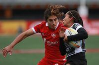 Canada's Bianca Farella looks to tackle Mexico's Daniela Alvarado during the first half of rugby action at the HSBC World Rugby Women's Sevens Series at Starlight Stadium in Langford, B.C., on Saturday, April 30, 2022. Canada will have home-field advantage for this summer's Rugby Americas North Sevens, which serves as the regional qualifier for the 2024 Paris Olympic Games. THE CANADIAN PRESS/Chad Hipolito