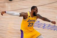 Los Angeles Lakers forward LeBron James celebrates during the second half in Game 4 of basketball's NBA Finals against the Miami Heat on Oct. 6, 2020. The Lakers beat the Heat 102-96 to take a 3-1 lead in the NBA Finals.