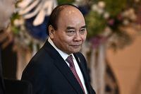 FILE PHOTO: Vietnam's President Nguyen Xuan Phuc arrives to attend APEC Leader's Dialogue with APEC Business Advisory Council during the Asia-Pacific Economic Cooperation (APEC) summit, November 18, 2022, in Bangkok, Thailand. Lillian Suwanrumpha/Pool via REUTERS/File Photo