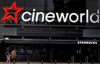 FILE PHOTO: A Cineworld cinema near Manchester, Britain, October 4, 2020. REUTERS/Phil Noble