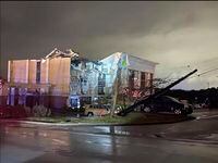 A Hampton Inn hotel is severely damaged after a tornado tore through Fultondale, Ala., on Jan. 25, 2021.