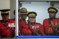 RCMP Commissioner Brenda Lucki, front centre, arrives for a change of command ceremony for incoming B.C. RCMP Commanding Officer, Deputy Commissioner Dwayne McDonald, in Langley, B.C., on Tuesday, September 20, 2022. THE CANADIAN PRESS/Darryl Dyck