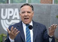 Coalition Avenir du Quebec leader Francois Legault speaks to reporters  while campaigning Wednesday, September 7, 2022  in Montreal. Quebec votes in the provincial election Oct. 3, 2022. THE CANADIAN PRESS/Ryan Remiorz