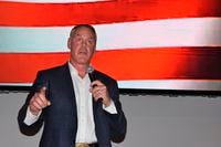 FILE - Montana House candidate and former Secretary of Interior Ryan Zinke speaks onstage at an event hosted by Butte-Silver Bow County Republicans at the Copper King Hotel and Convention Center, May 13, 2022, in Butte, Mont.  (AP Photo/Matthew Brown, File)