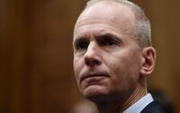 In this file photo taken on Oct. 30, 2019, Boeing CEO Dennis Muilenburg testifies at a hearing in front of congressional lawmakers, on Capitol Hill, in Washington, D.C.