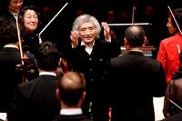 FILE -- The conductor Seiji Ozawa raises his hands to aknowledge the Saito Kinen Orchestra after a performance at Carnegie Hall in New York on Dec. 18, 2010. His performances with that orchestra, which he helped found, were his last in New York. Ozawa, the high-spirited Japanese conductor who took the Western classical music world by storm in the 1960s and Õ70s and was music director of the Boston Symphony Orchestra from 1973 to 2002, died on Feb. 6, 2024 in Tokyo. He was 88. (Hiroyuki Ito/The New York Times)